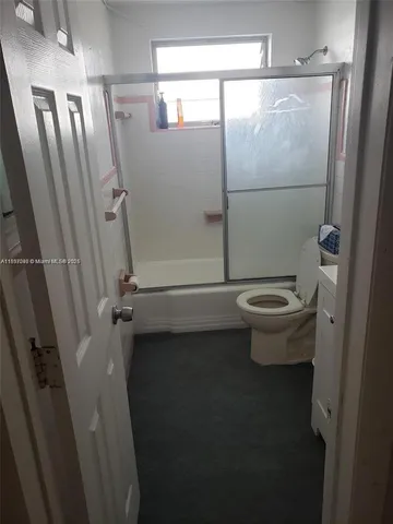 an aerial view of a city with lots of residential buildings