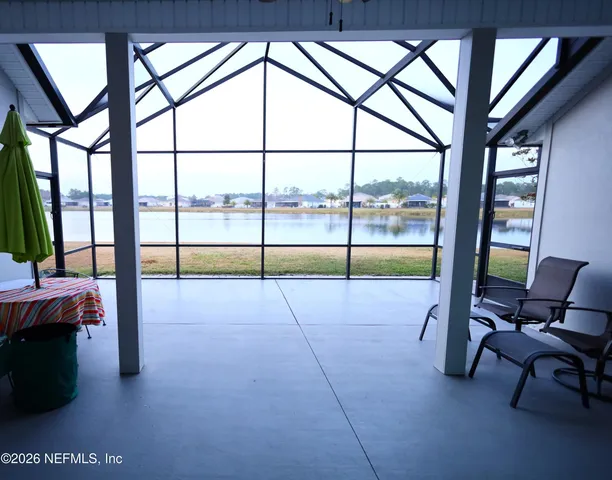 a view of a lake from a balcony