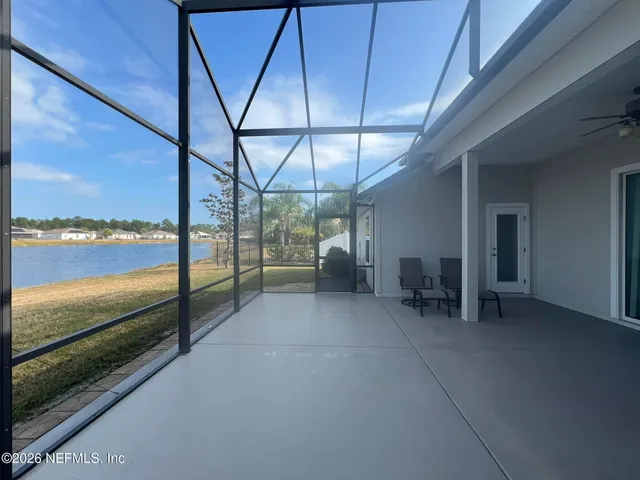 a view of outdoor space with a lake view