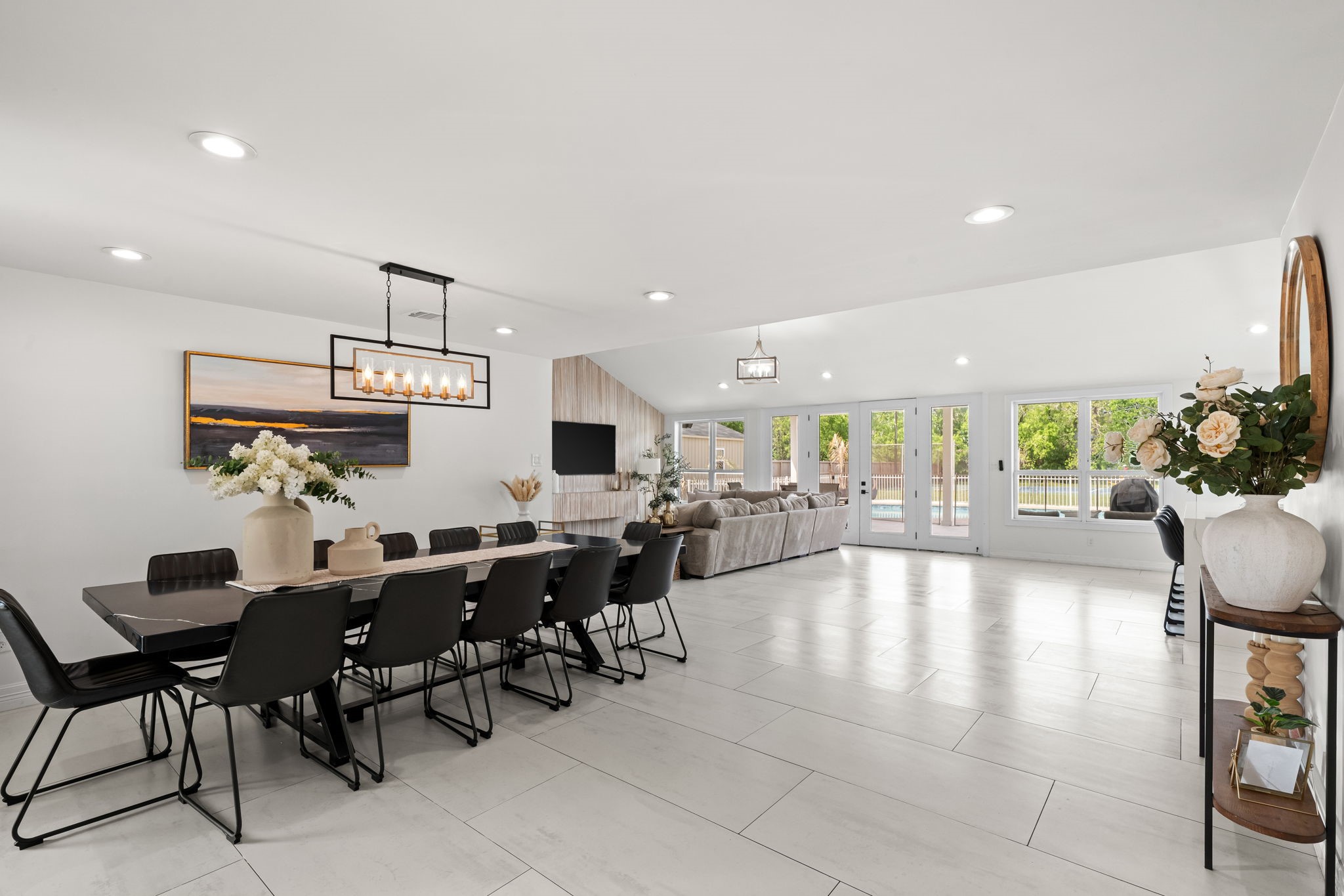 8800 Brae Acres Road Houston, TX 77074 - Photo 5 of 48 The home's formal dining area sits adjacent to the entry and diagonal from the kitchen creating a meaningful and separate space to host that still feels connected to the rest of the home.