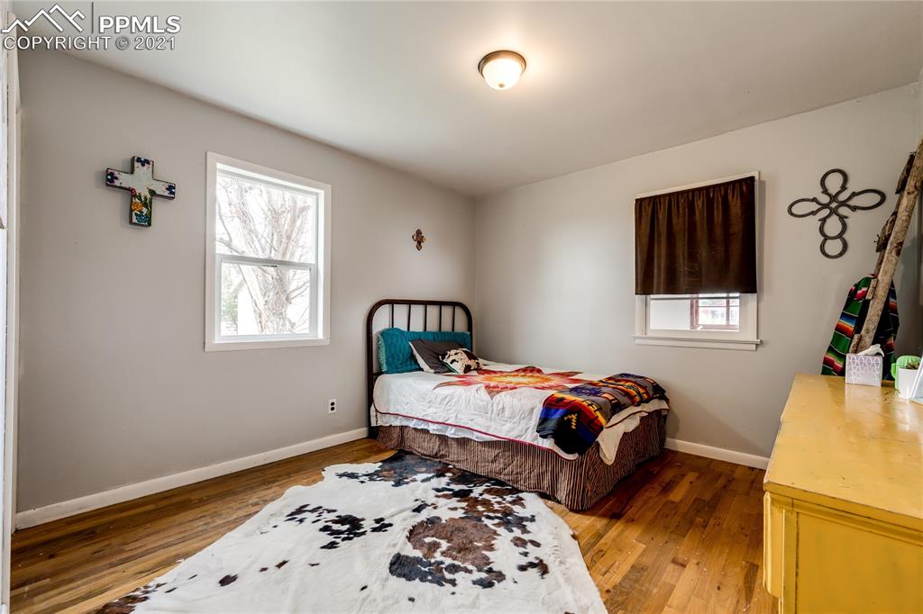 38810 Fossinger Road Rush, CO 80833 - Photo 18 of 35 a bedroom with bed and a window