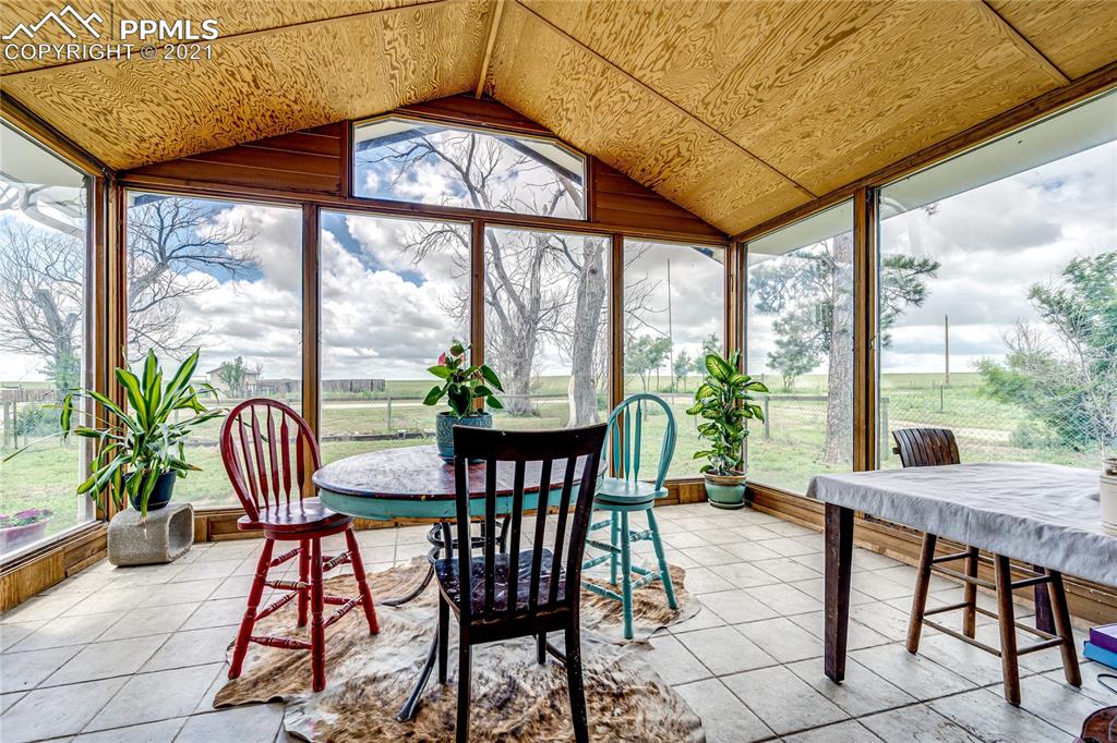 38810 Fossinger Road Rush, CO 80833 - Photo 21 of 35 a view of a dining room with furniture window and outside view