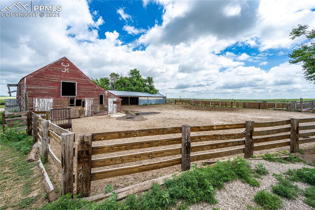 38810 Fossinger Road Rush, CO 80833 - Photo 22 of 35 a view of a house with a yard