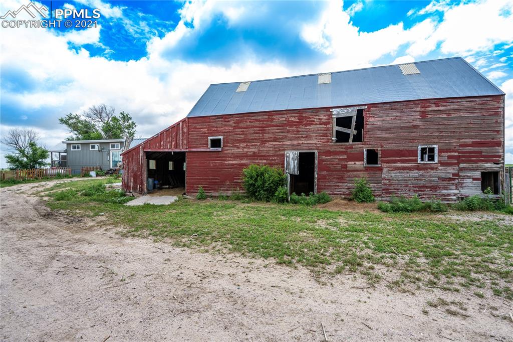 38810 Fossinger Road Rush, CO 80833 - Photo 33 of 35 a front view of a house with garden
