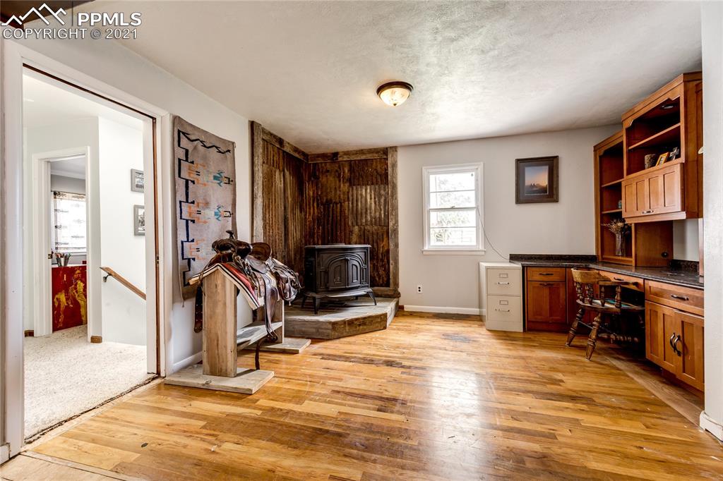 38810 Fossinger Road Rush, CO 80833 - Photo 10 of 35 a view of a livingroom with furniture and a kitchen