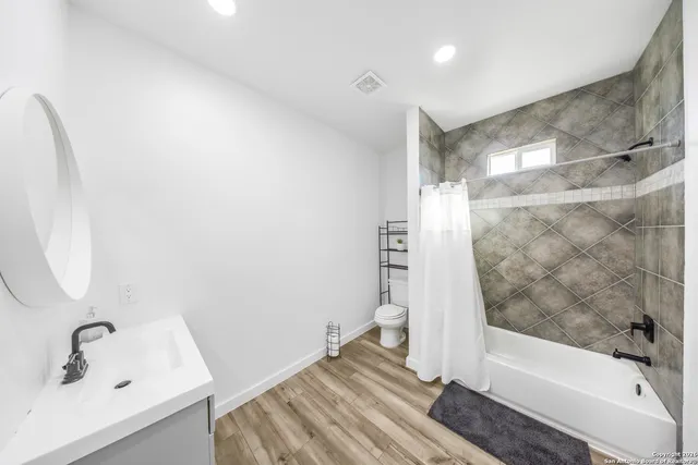 a bathroom with a sink and a tub