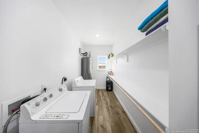 a utility room with dryer and washer