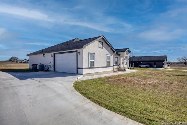a house view with a outdoor space