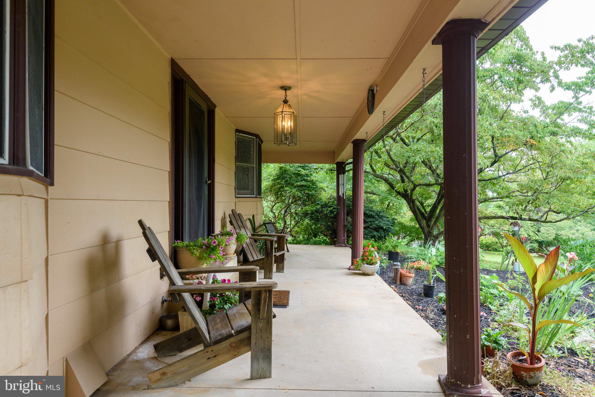 500 Reeds Road Downingtown, PA 19335 - Photo 2 of 37 Large front porch with views of perennials