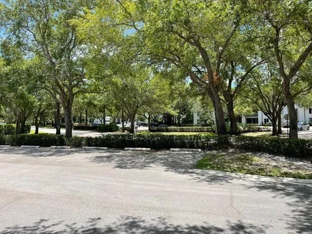 a view of a fountain in front of a house