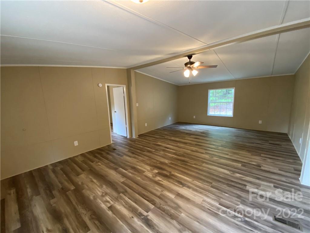 7109 Rushing Road Peachland, NC 28133 - Photo 28 of 40 wooden floor in an empty room with a window