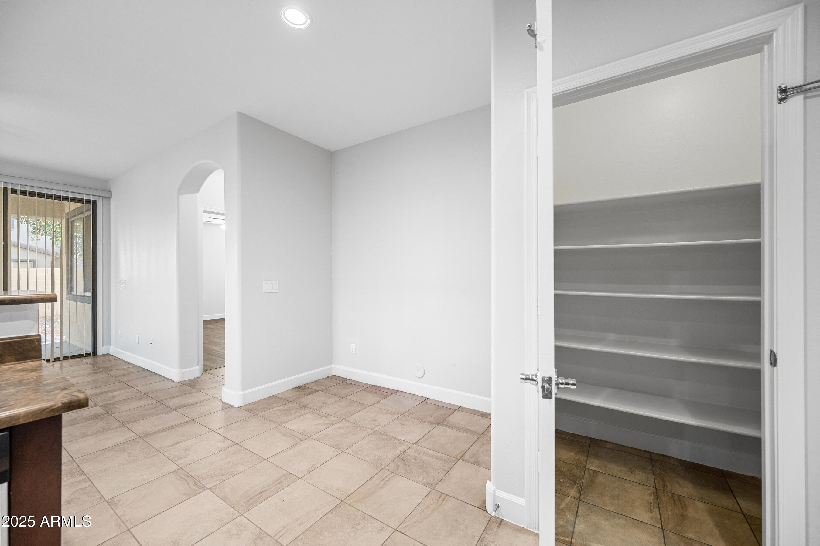 10805 West Woodland Avenue Avondale, AZ 85323 - Photo 13 of 25 a view of an empty room