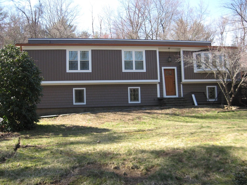 5 Old Amherst Road, Unit 5B Belchertown, MA 01007 - Photo 1 of 37 a backyard of a house