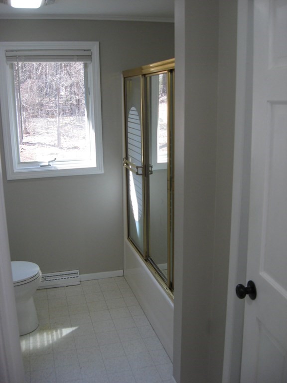 5 Old Amherst Road, Unit 5B Belchertown, MA 01007 - Photo 18 of 37 a bathroom with a window