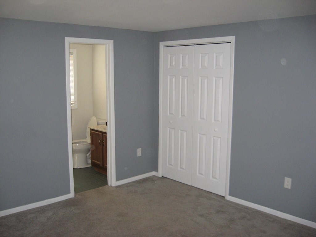 5 Old Amherst Road, Unit 5B Belchertown, MA 01007 - Photo 20 of 37 wooden floor and closet in a room