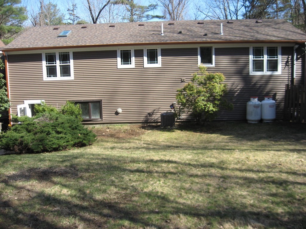 5 Old Amherst Road, Unit 5B Belchertown, MA 01007 - Photo 2 of 37 a view of a house with a yard