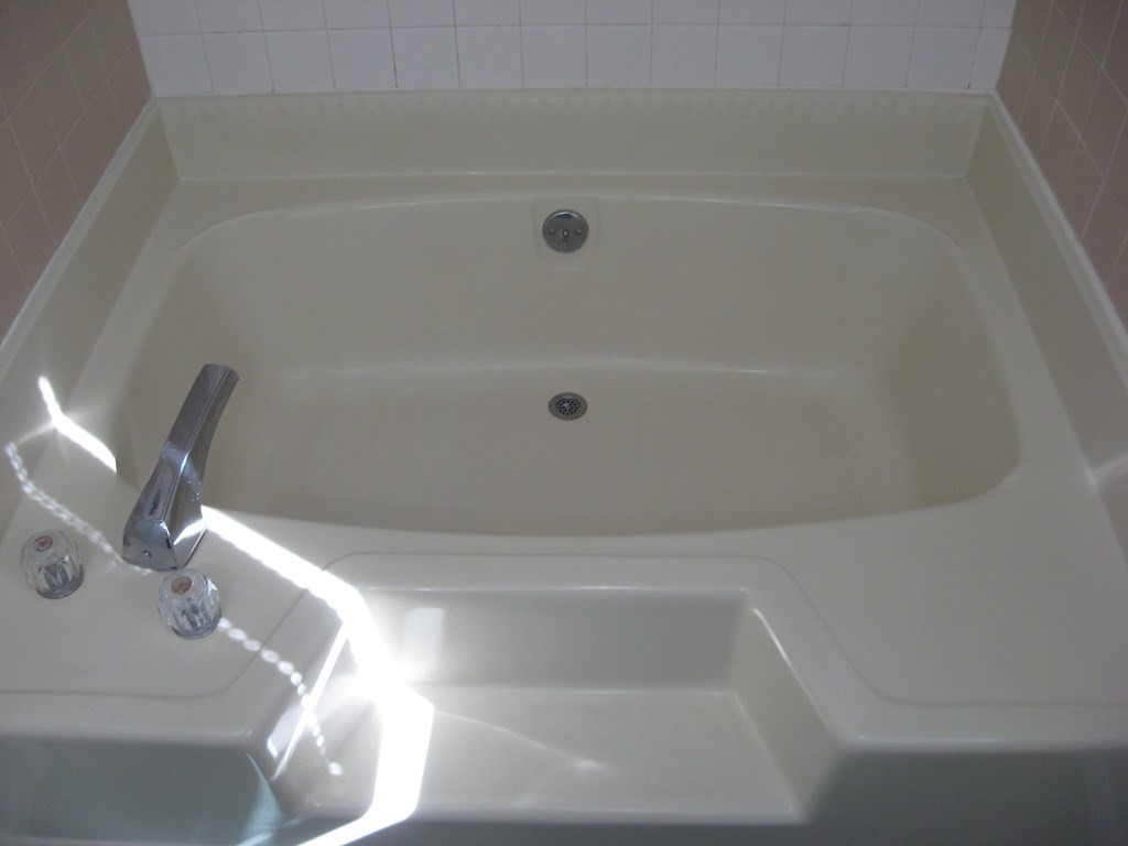 5 Old Amherst Road, Unit 5B Belchertown, MA 01007 - Photo 24 of 37 a bathroom with a bathtub