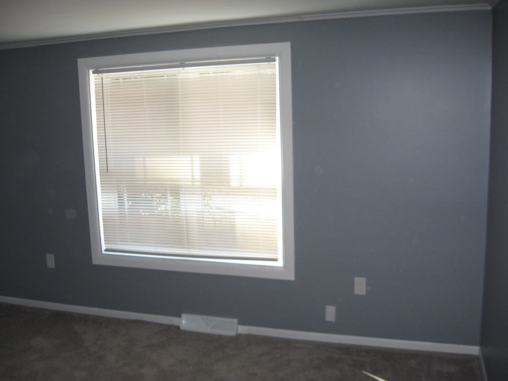 5 Old Amherst Road, Unit 5B Belchertown, MA 01007 - Photo 29 of 37 a view of an empty room with a window