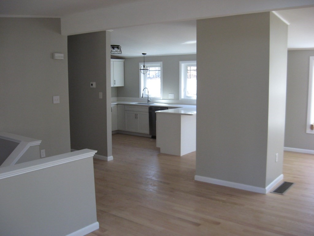 5 Old Amherst Road, Unit 5B Belchertown, MA 01007 - Photo 31 of 37 a room with a white wall storage and utility