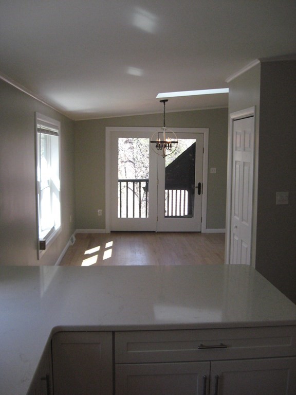 5 Old Amherst Road, Unit 5B Belchertown, MA 01007 - Photo 9 of 37 a view of an empty room with a window