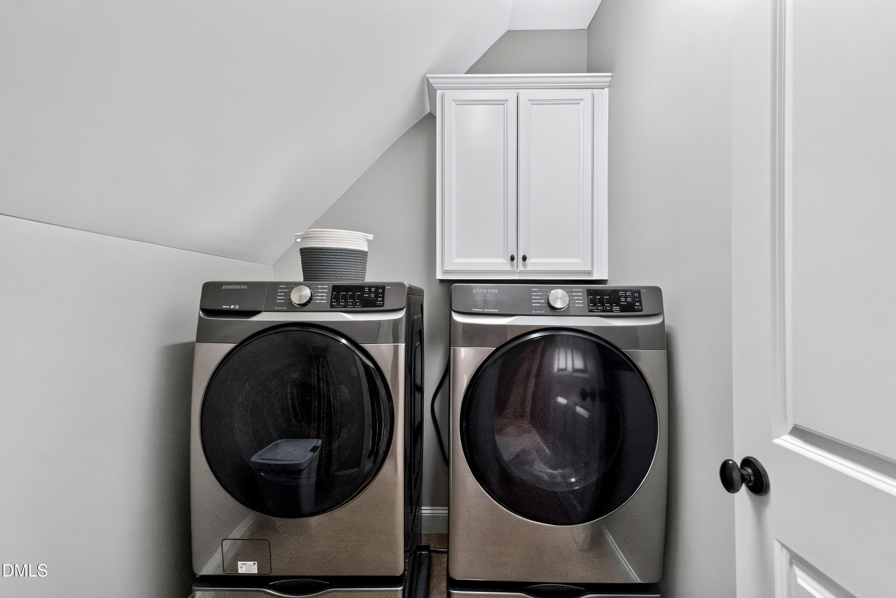 2745 Oberlin Road, Unit 103 Raleigh, NC 27608 - Photo 19 of 23 a utility room with dryer and washer