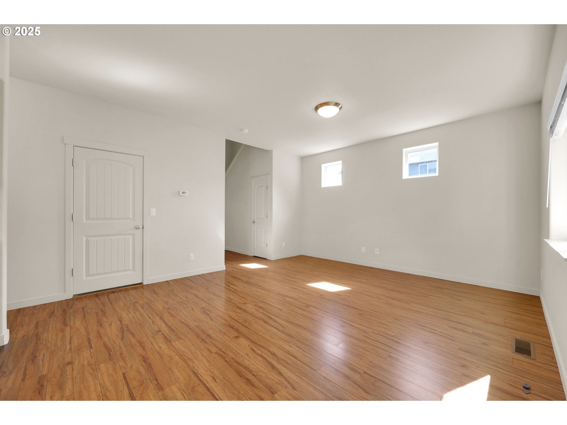 490 Raber Road Eugene, OR 97402 - Photo 13 of 37 a view of an empty room and wooden floor