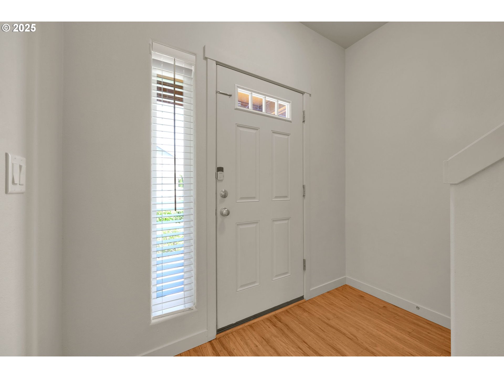 490 Raber Road Eugene, OR 97402 - Photo 15 of 37 a view of an empty room with wooden floor and a window