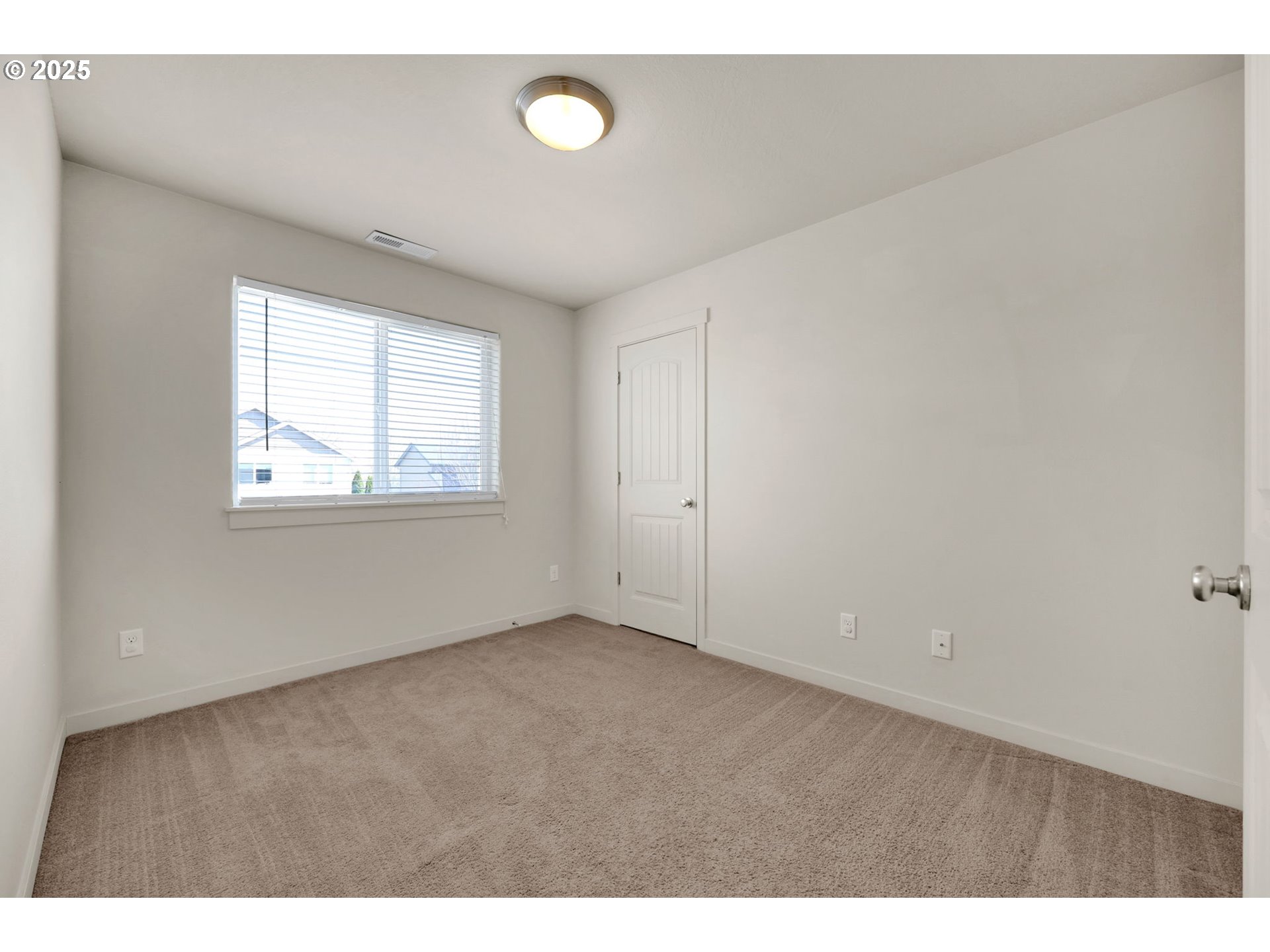 490 Raber Road Eugene, OR 97402 - Photo 24 of 37 a view of an empty room with a window