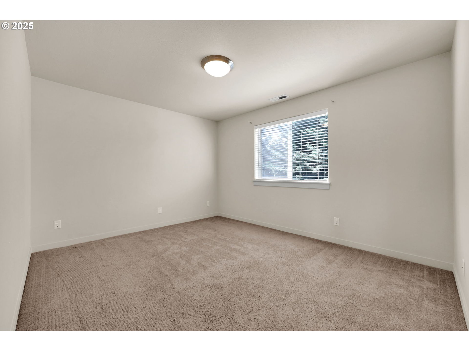 490 Raber Road Eugene, OR 97402 - Photo 27 of 37 a view of an empty room with a window