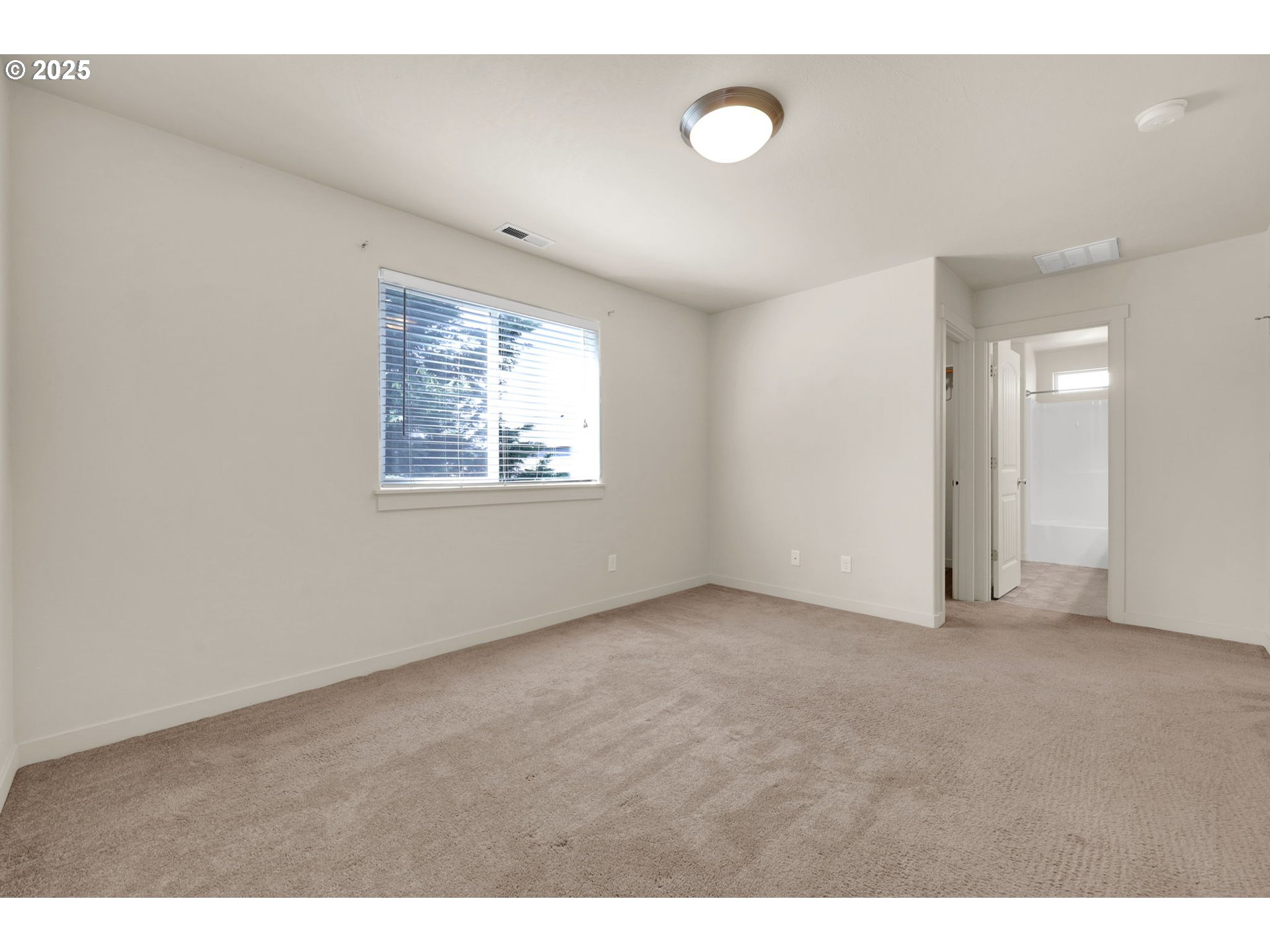 490 Raber Road Eugene, OR 97402 - Photo 28 of 37 a view of an empty room with a window