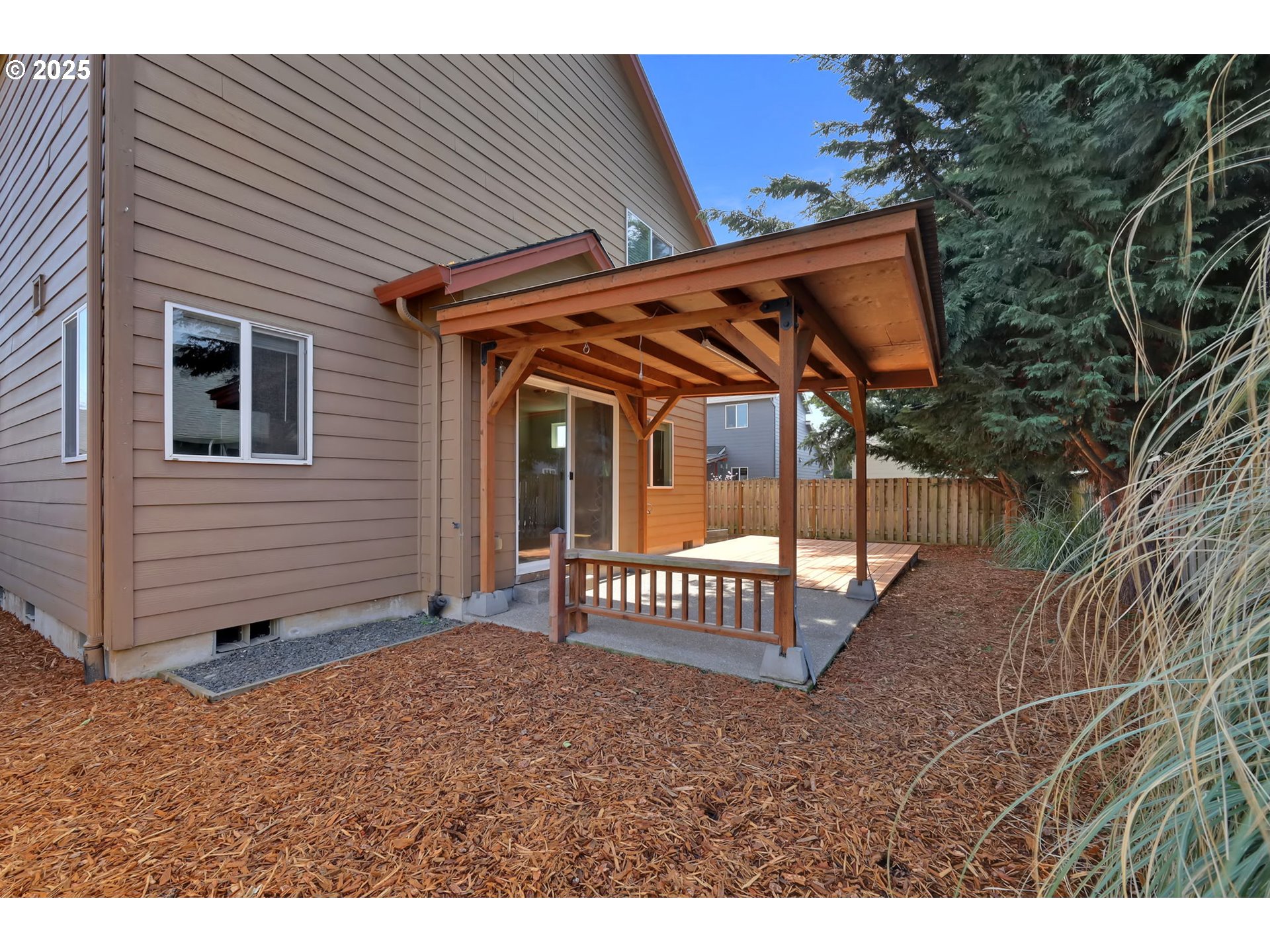 490 Raber Road Eugene, OR 97402 - Photo 33 of 37 a view of a house with backyard and sitting area