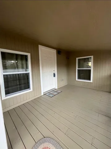 a view of an empty room and window