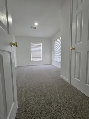 a view of room and front door