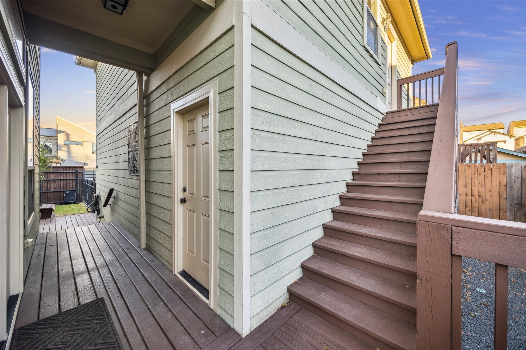 840 Alexander Street Houston, TX 77007 - Photo 25 of 39 Leaving the living room French doors you find yourself at the breezeway with access to the side yard, garage apartment, garage and side gardens.