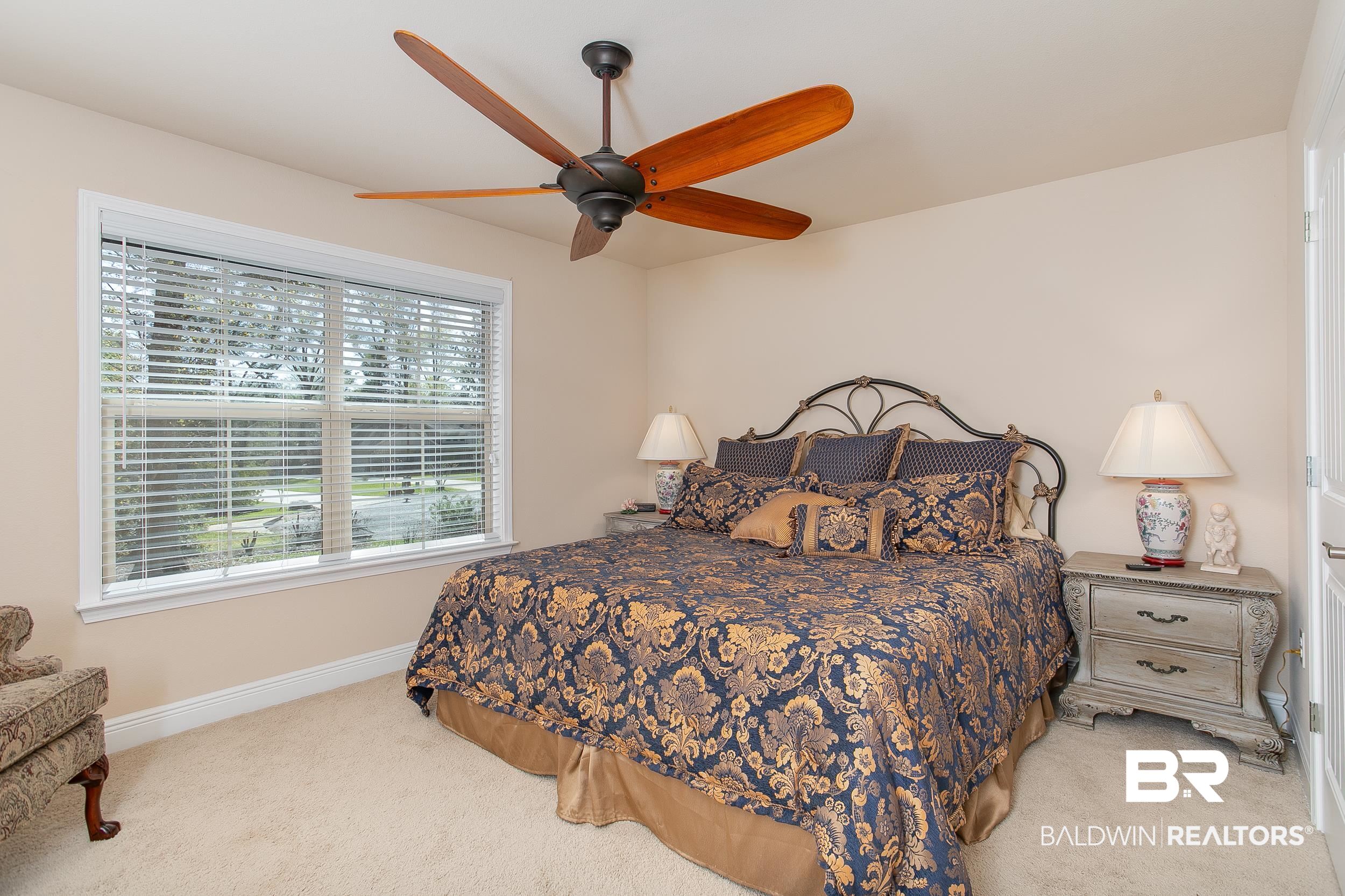 13154 Vincent Court Foley, AL 36535 - Photo 25 of 41 Carpeted bedroom featuring baseboards and ceiling fan