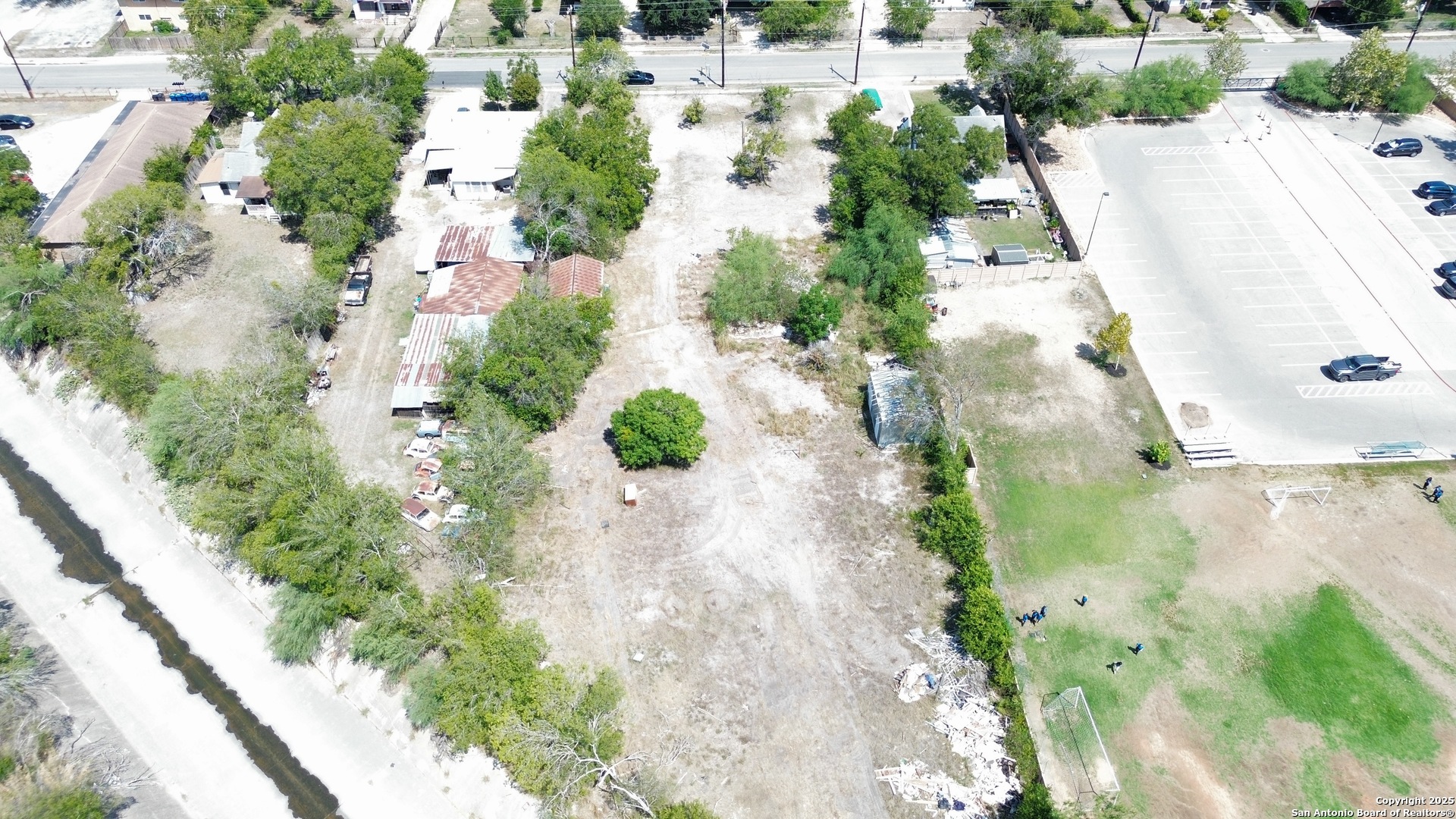 158 West Harding Boulevard San Antonio, TX 78221 - Photo 5 of 5 an aerial view of residential house with swimming pool and wooden fence