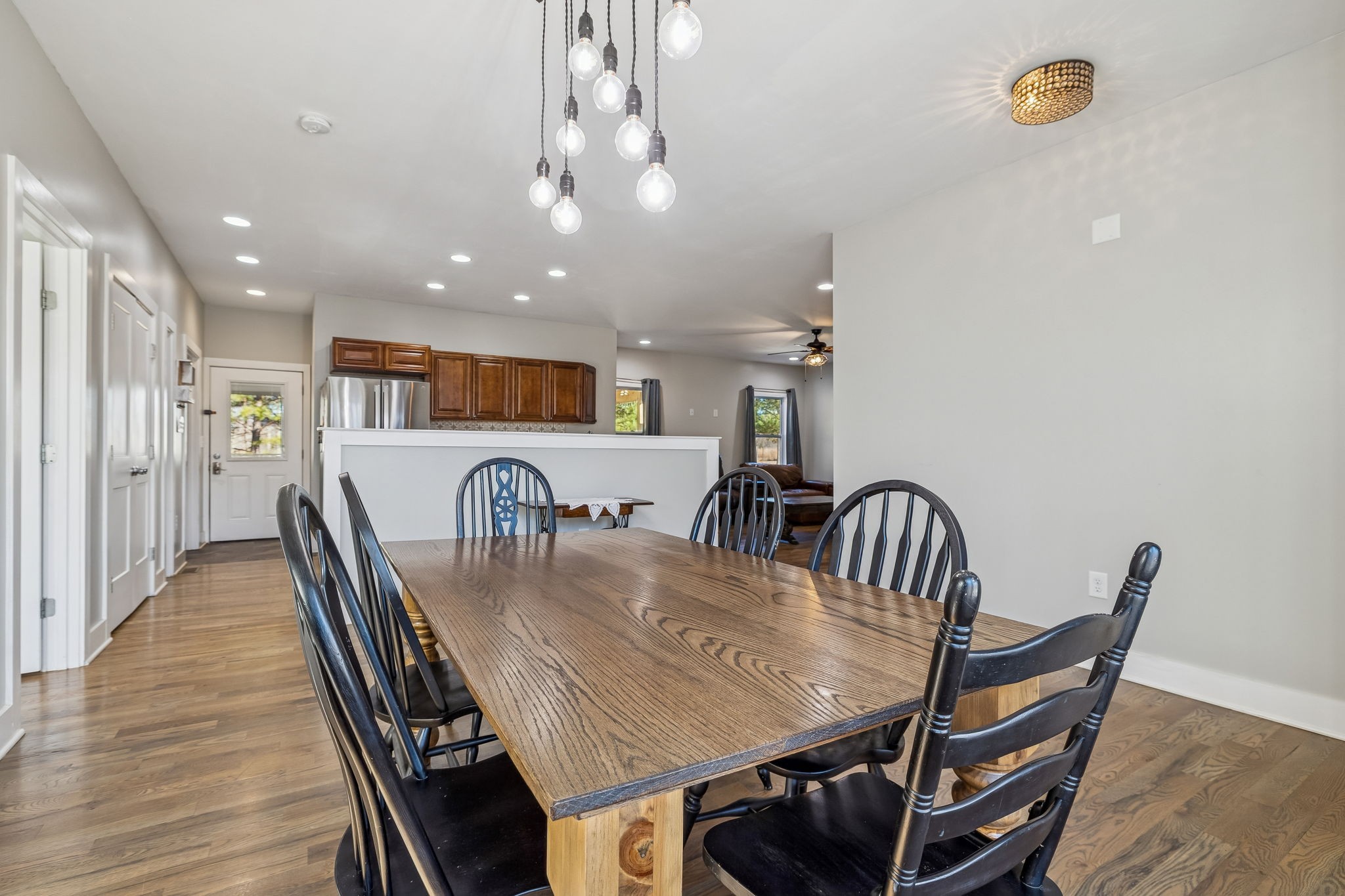 9681 Bud Qurriel Road Bon Aqua, TN 37025 - Photo 14 of 63 a view of a dining room with furniture