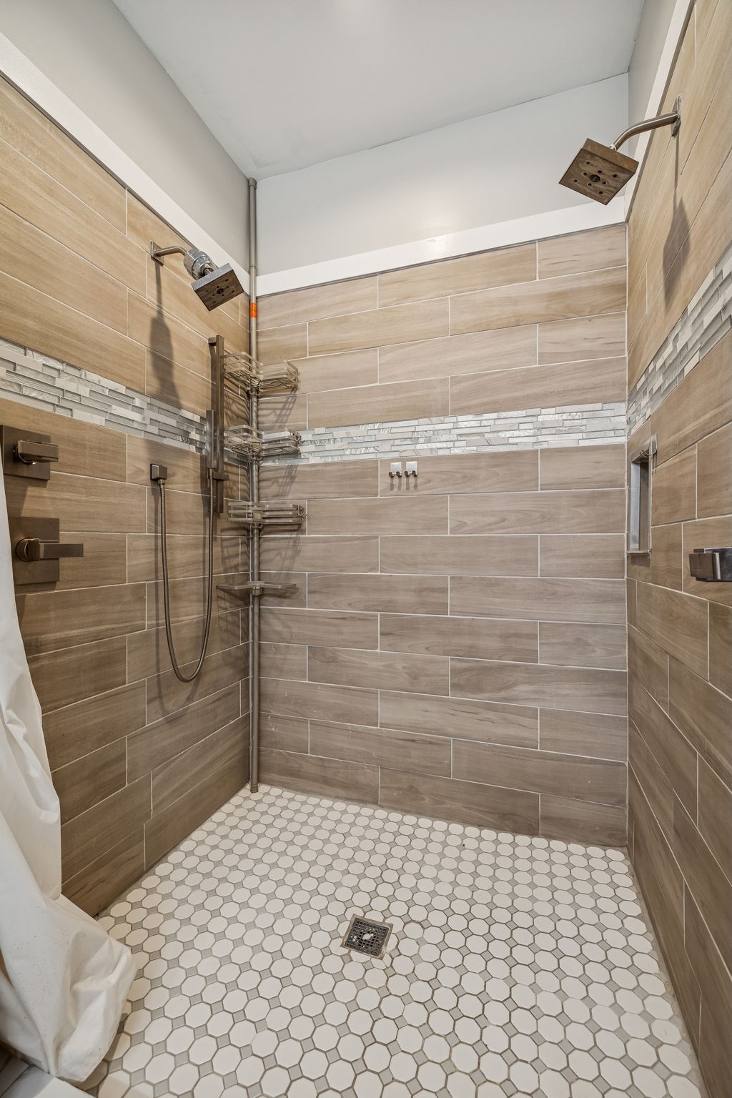 9681 Bud Qurriel Road Bon Aqua, TN 37025 - Photo 23 of 63 a bathroom with a shower