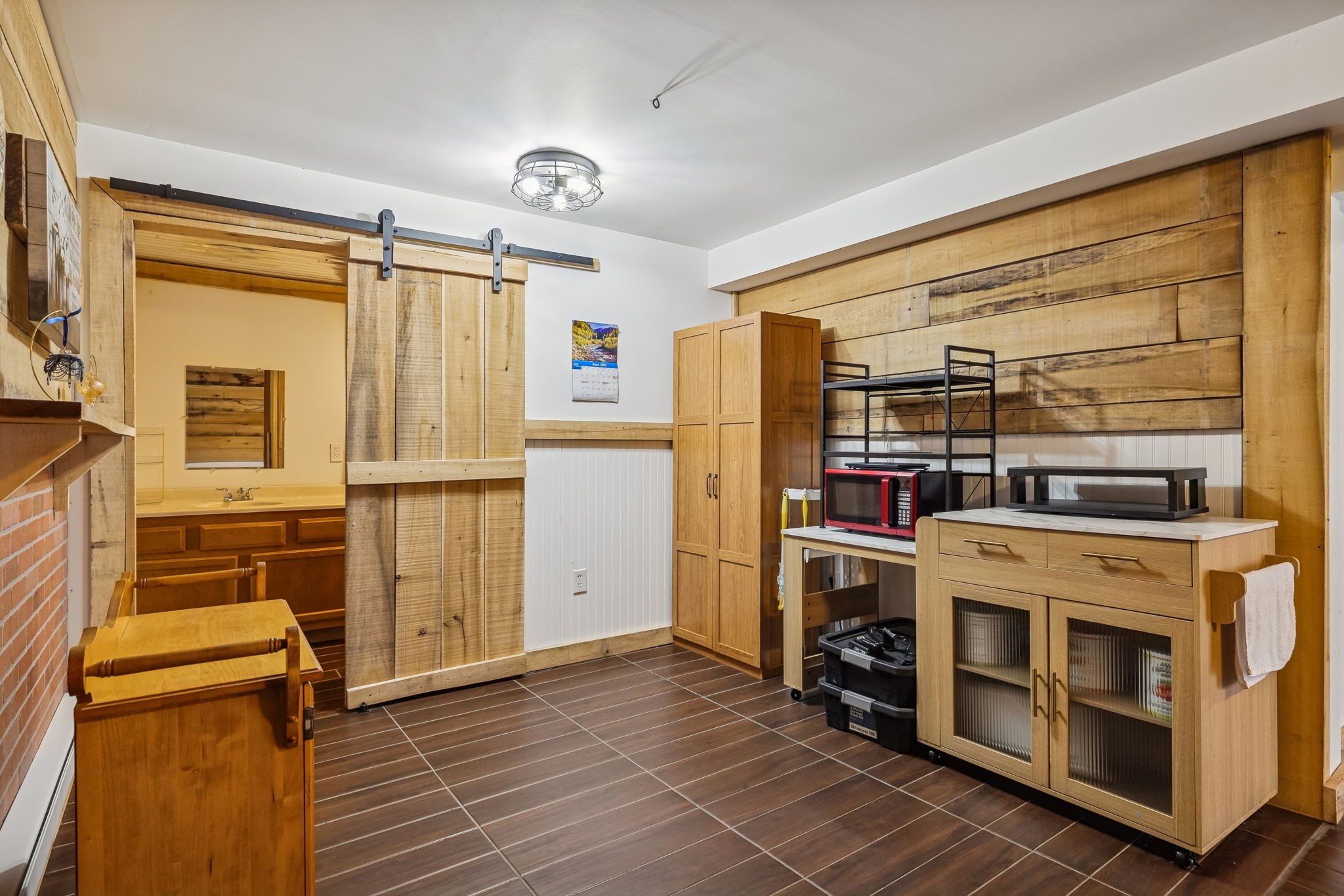 9681 Bud Qurriel Road Bon Aqua, TN 37025 - Photo 41 of 63 a view of a kitchen with fridge wooden floor and window