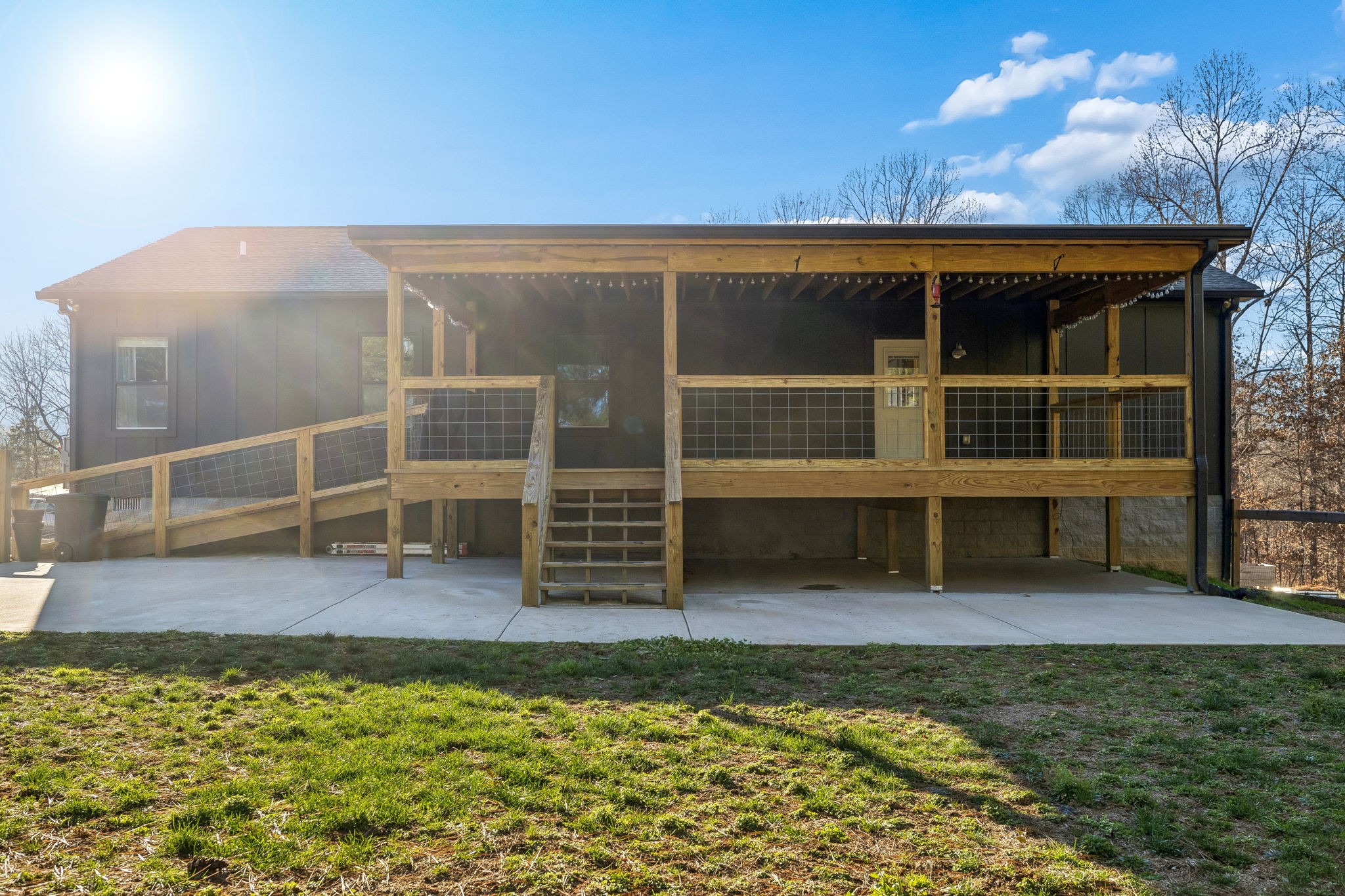 9681 Bud Qurriel Road Bon Aqua, TN 37025 - Photo 49 of 63 a view of a house with a backyard