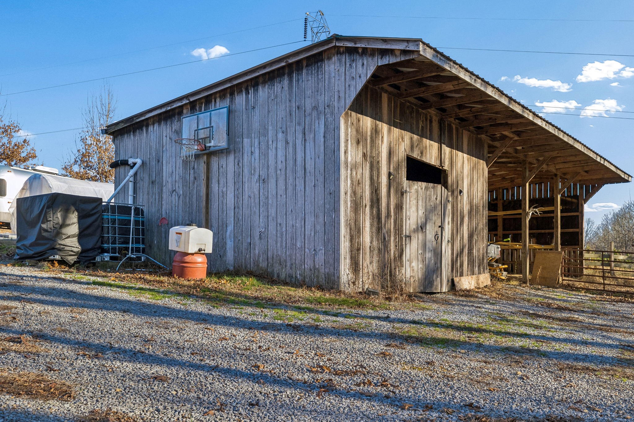 9681 Bud Qurriel Road Bon Aqua, TN 37025 - Photo 56 of 63 a view of a house with wooden fence