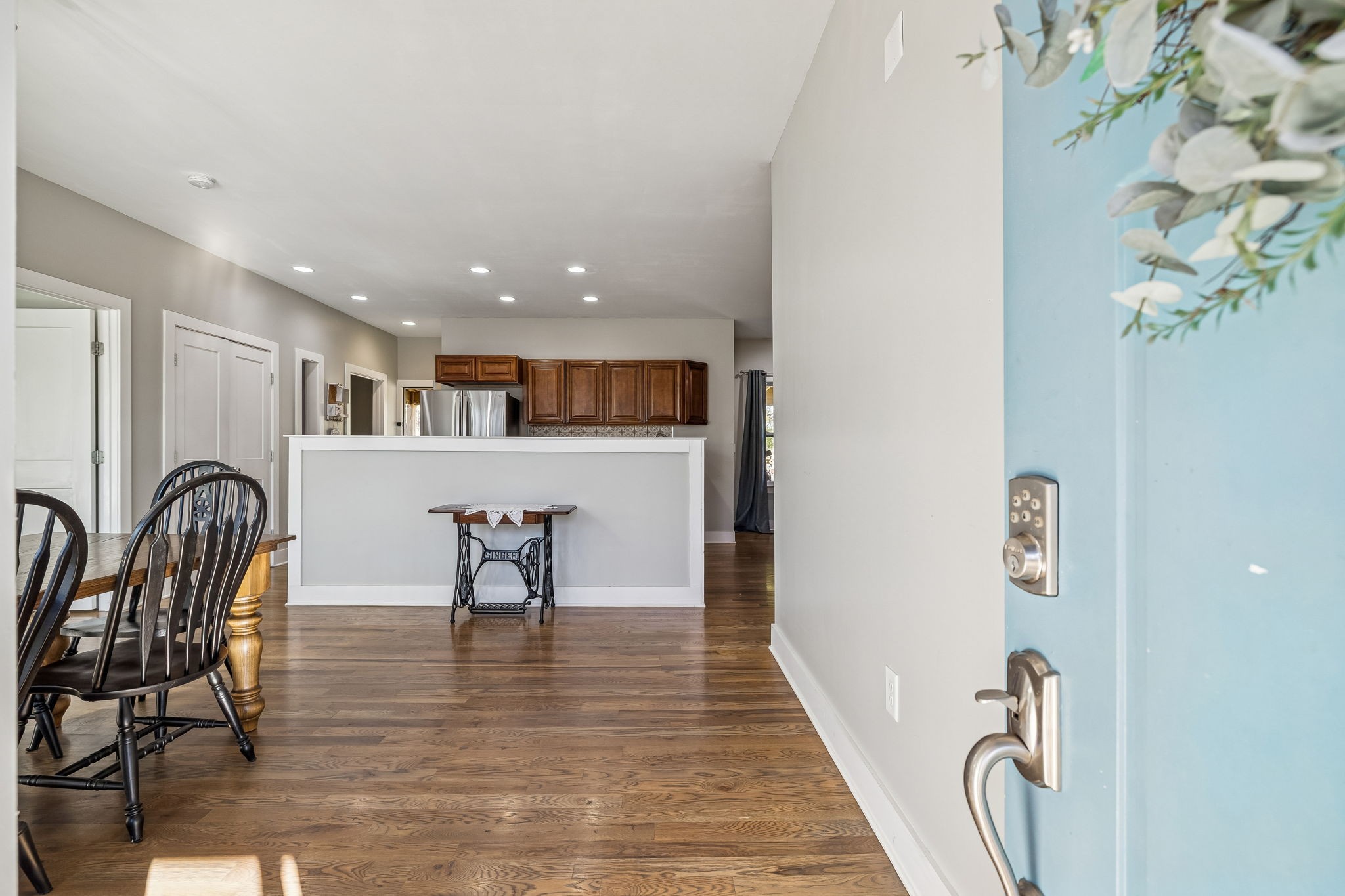 9681 Bud Qurriel Road Bon Aqua, TN 37025 - Photo 8 of 63 a view of a entryway with furniture and wooden floor