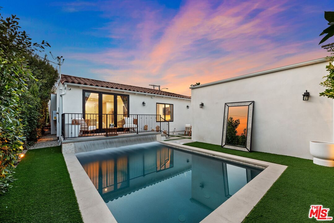 100 South La Jolla Avenue Los Angeles, CA 90048 - Photo 26 of 31 a view of swimming pool with seating area
