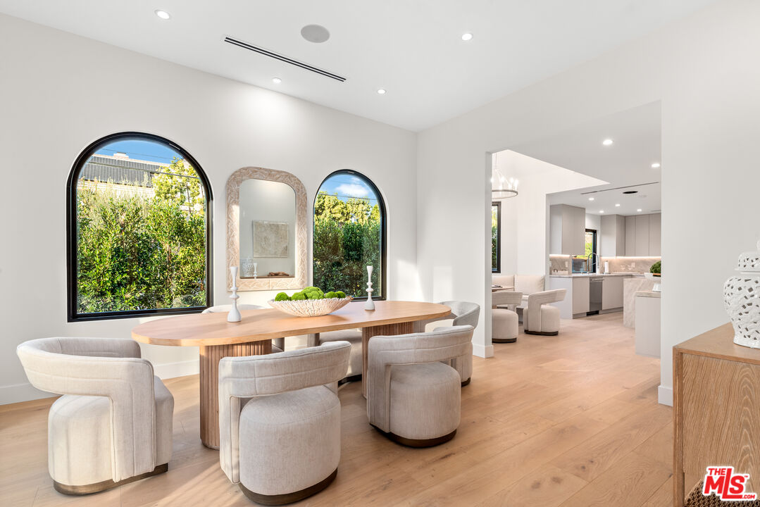 100 South La Jolla Avenue Los Angeles, CA 90048 - Photo 7 of 31 a living room with furniture and a large window