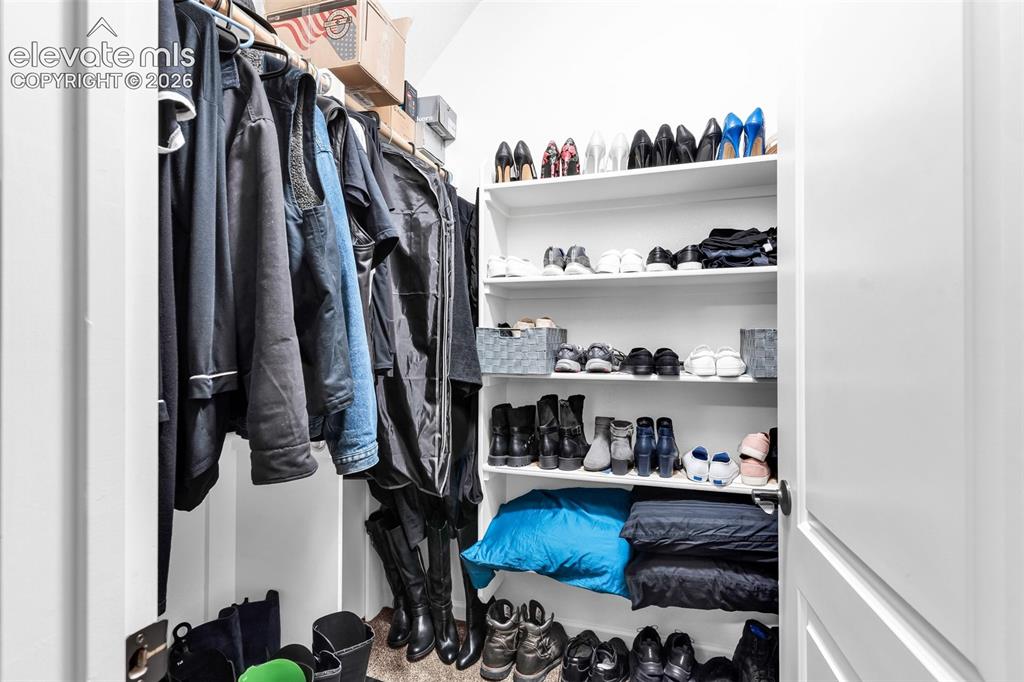 415 Empire Road Canon City, CO 81212 - Photo 20 of 40 a view of walk in closet with clothes and shoes