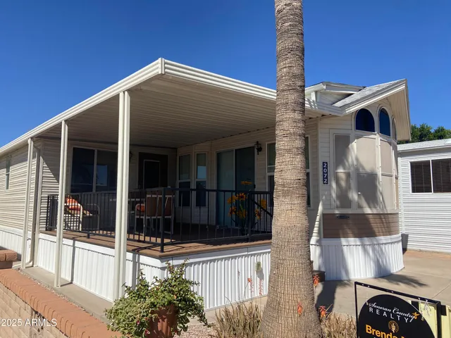 a front view of a house with a porch