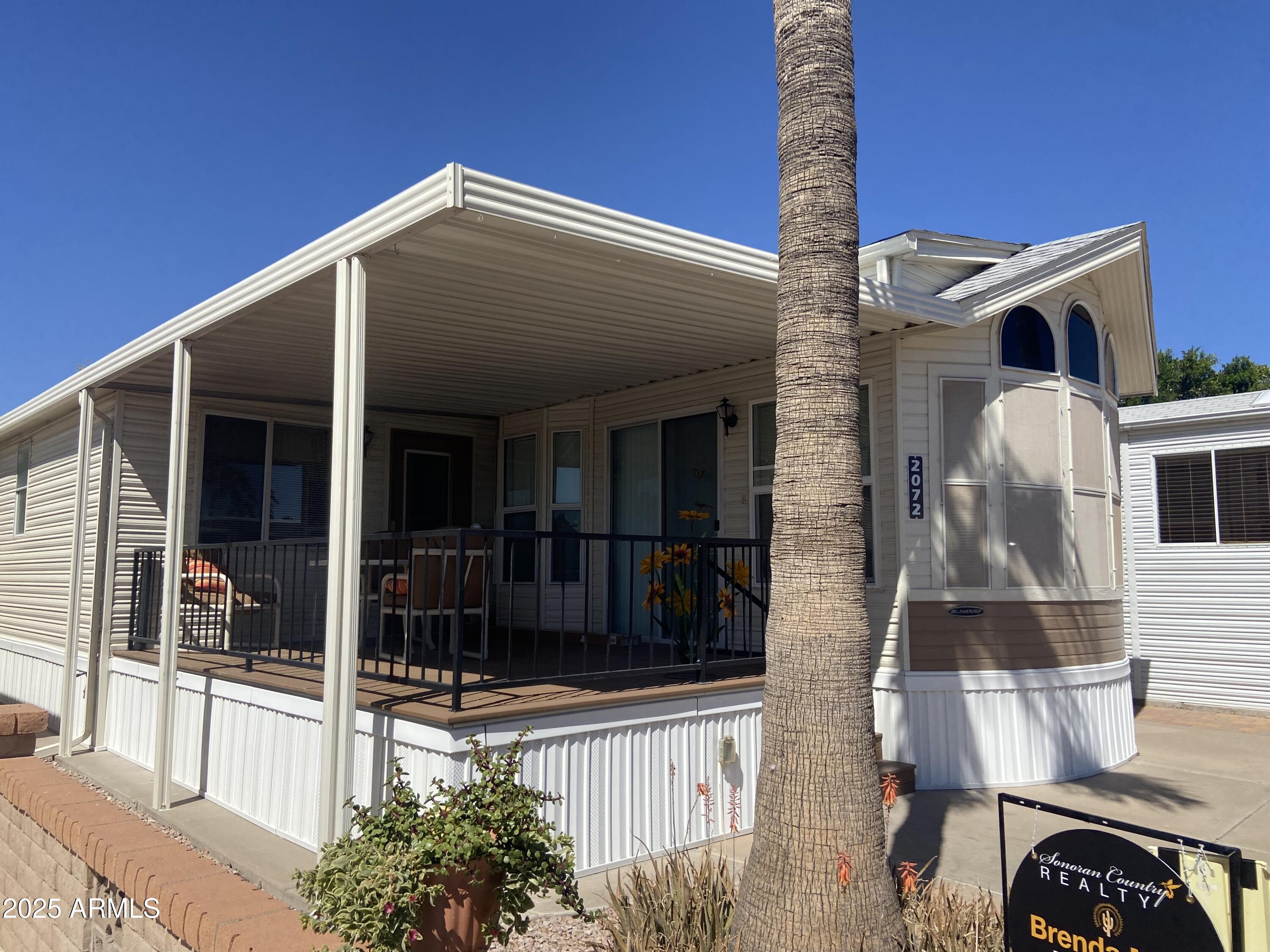 a front view of a house with a porch