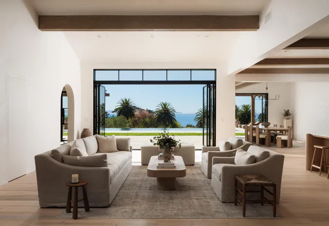 a view of swimming pool with seating space