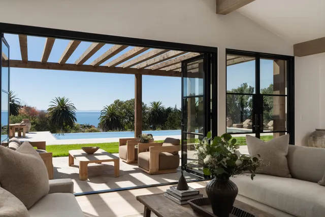 a view of a living room with a balcony