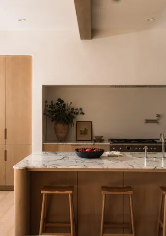 a bathroom with a table and a shower